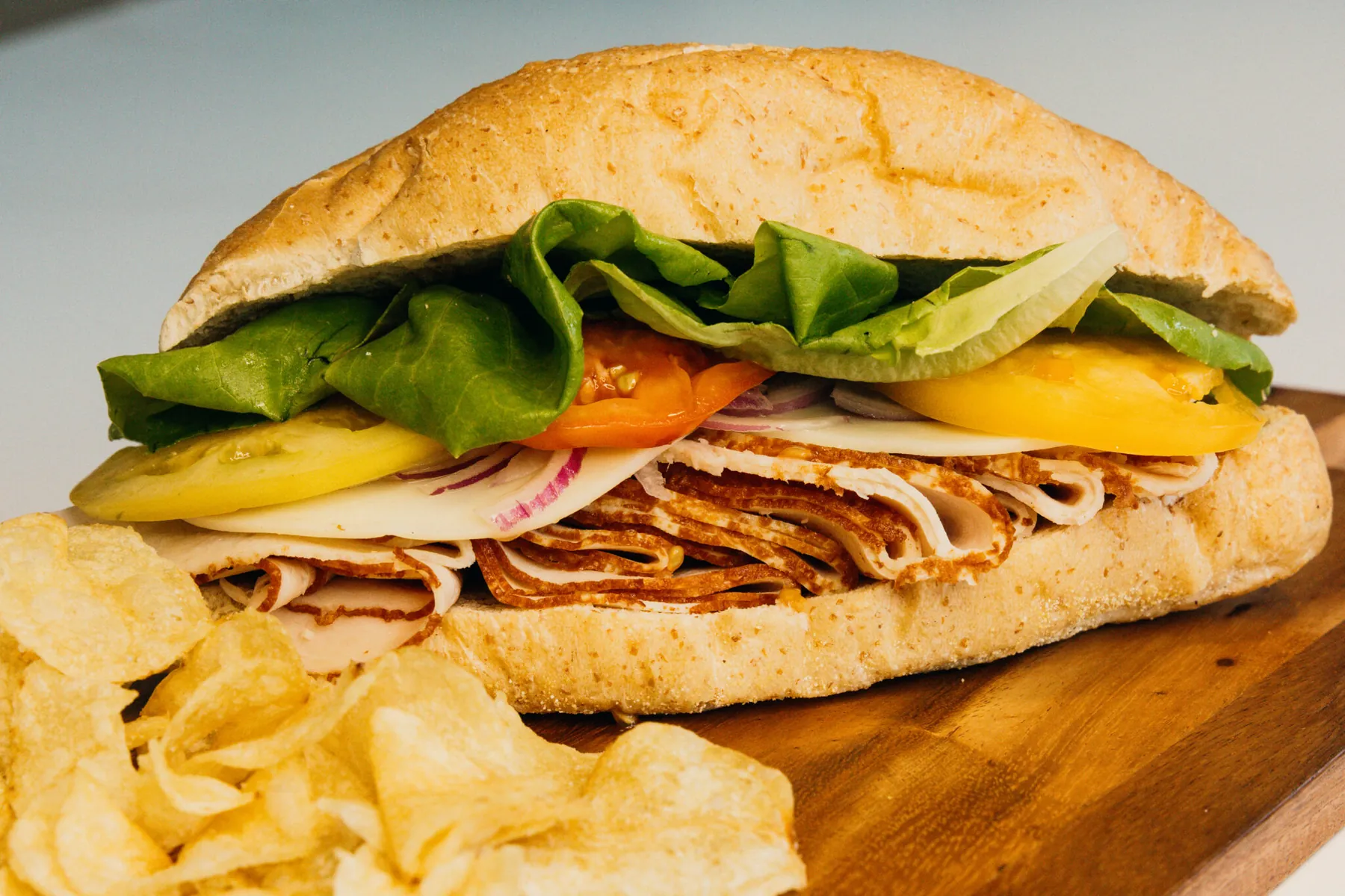A made-to-order sandwich with chips