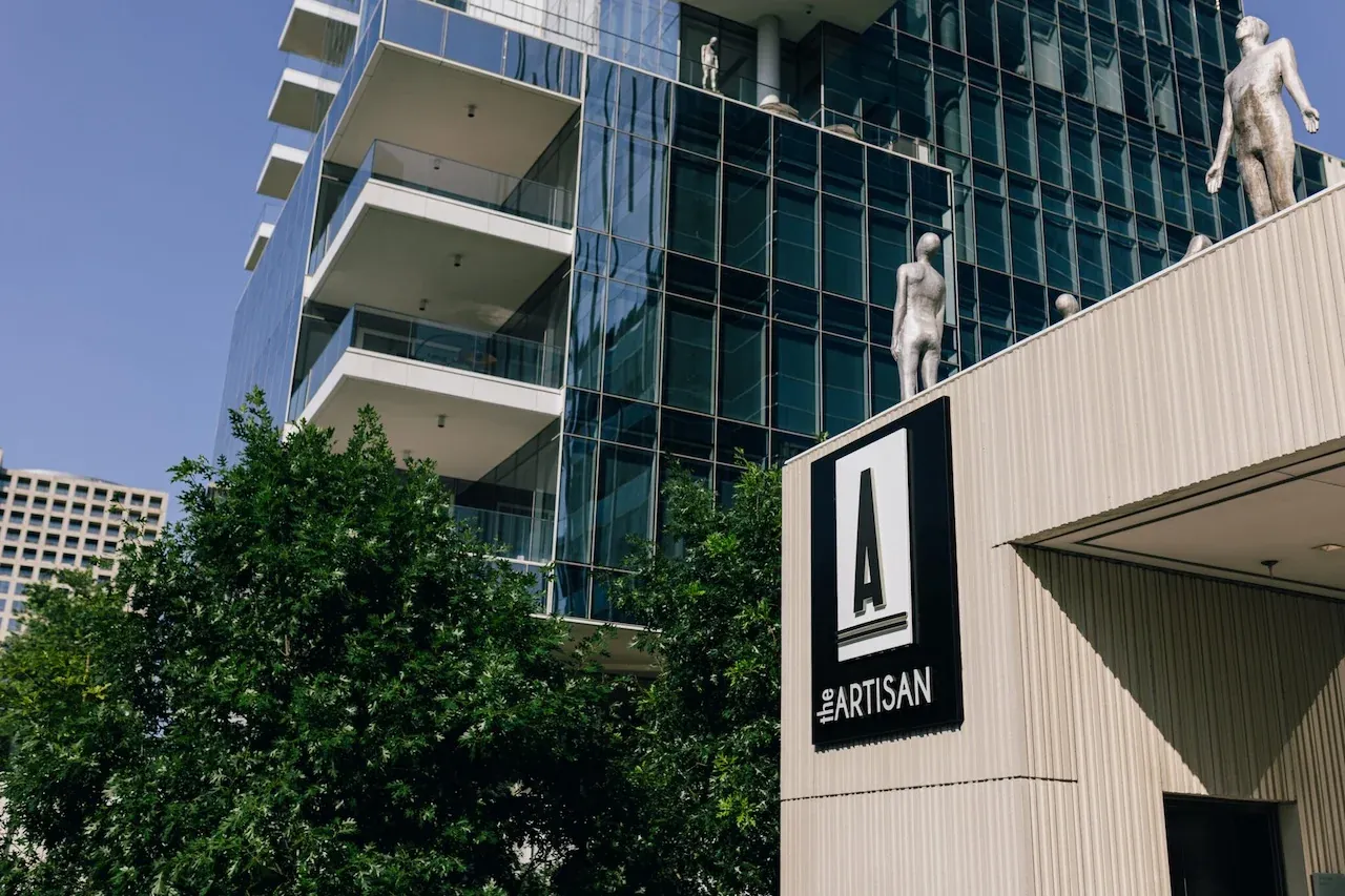 The Artisan signage on the exterior of KPMG Plaza at HALL Arts