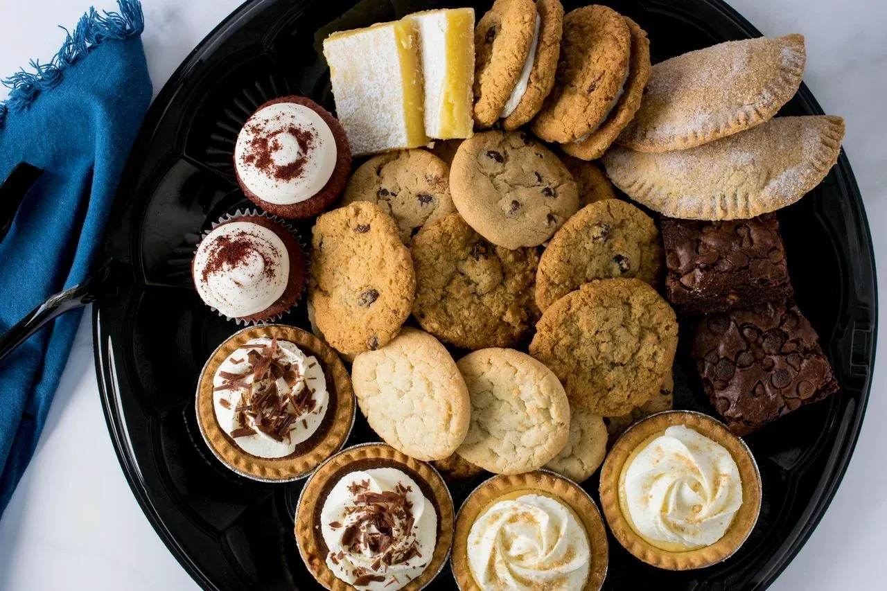 A catering platter of assorted pastries and bites